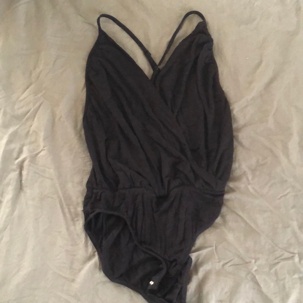 Black Leo deep V with open back size S